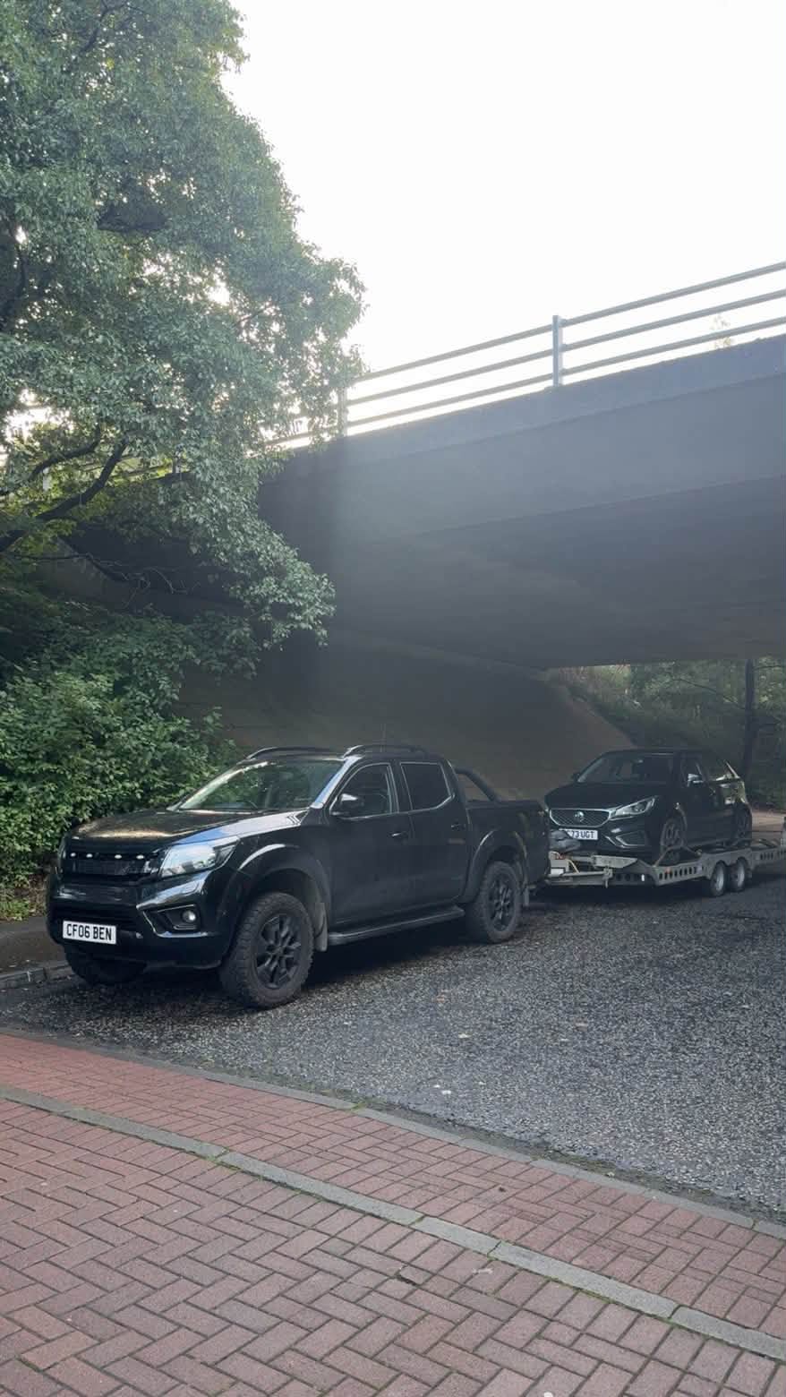 A non-running car safely loaded onto Connor Waldron's recovery trailer